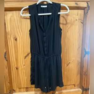 Super cute black button up romper